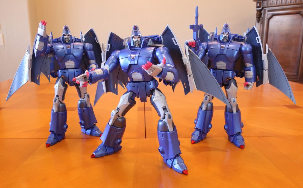 Fans Toys FT-61 Inquisitor / Masterpiece Scourge along with two more copies to make Masterpiece Sweeps in robot modes.