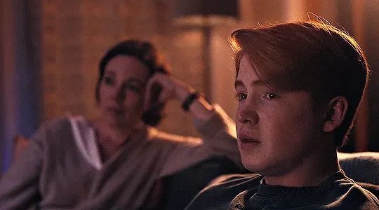 Nick, in the show Heartstopper, watching Pirates of the Caribbean with his mom and silently having a bi crisis