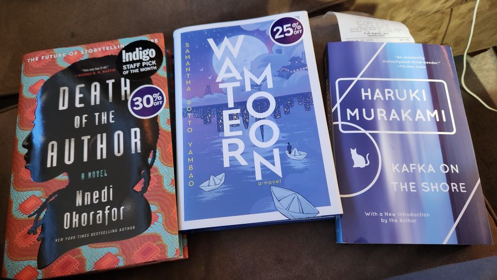 Picture showing three books: Nnedi Okorafor's Death of the Author, Samantha Sotto Yambao's Water Moon, and Haruki Murakami's Kafka on the Shore. 