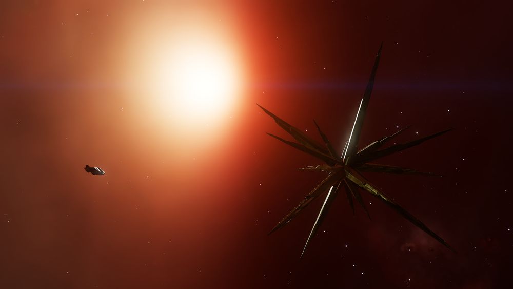 Capture d'écran du jeu Elite Dangerous où on voit un vaisseau à côté d'un énorme cristal de l'espace très pointu qui fait 12 fois sa taille