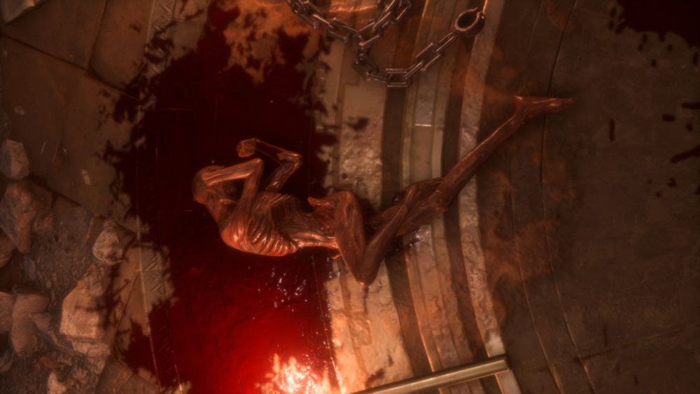 Dried out corpse in a twisted fetal position next to blood stain and chains. Screenshot from Dragon Age Veilguard