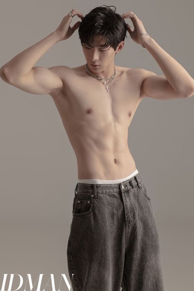 A photo of a topless young Asian man