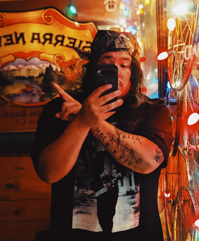 Kevin taking a selfie with cool lighting