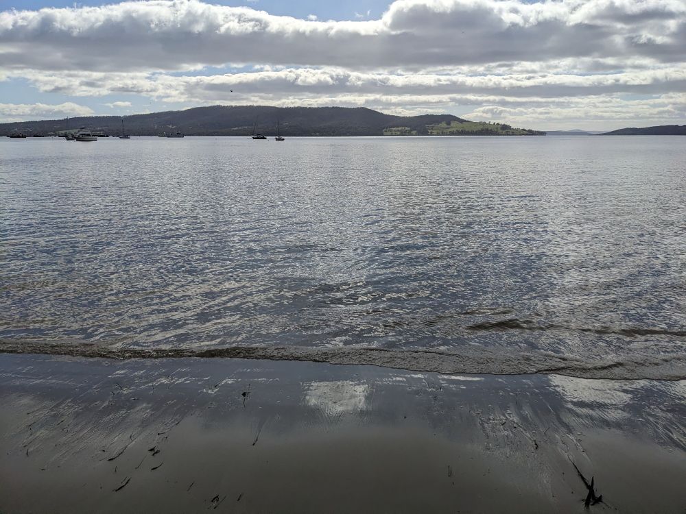 Grey choppy ocean and clouds 