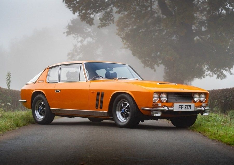 It's a glorious Jensen Interceptor in orange. It's a sleek car. 
