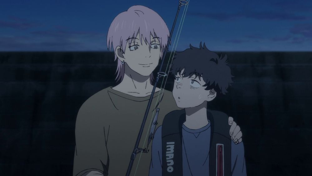 a tall pink haired guy (takaaki) and a shorter black haired guy (tsunehiro) standing close and looking at each other. takaaki has one hand on tsunehiro's shoulder, and in the other he's holding a fishing rod. the way the fishing rod is positioned cuts the image in half, visually separating the two guys. 