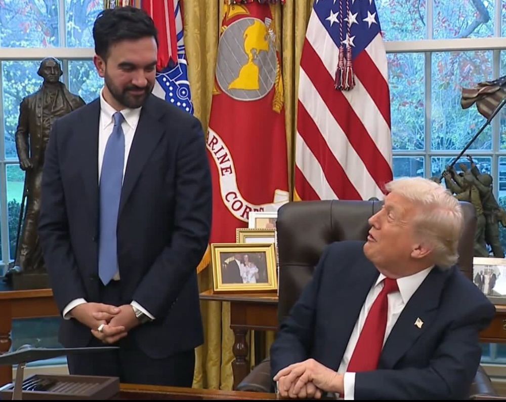 Seated Trump fawns over Mamdani in the Oval Office.