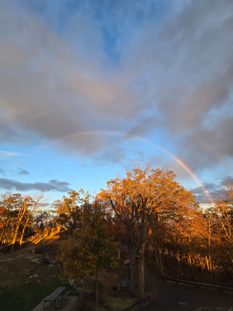 Rainbow at top of mountain