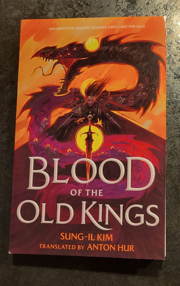 The book "Blood of the Old Kings" by Sung-Il Kim and translated by Anton Hur. A woman with a burning eye reaches for a black and red sword. Behind her a many-eyed dragon coils into the sky. 