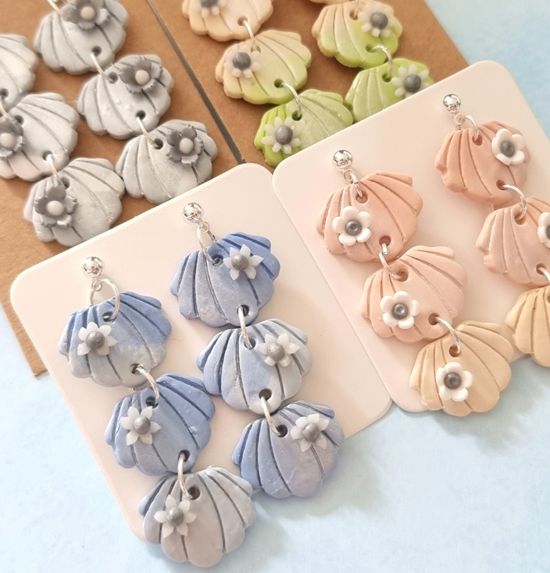 Selection of clam shell earrings in different colours 