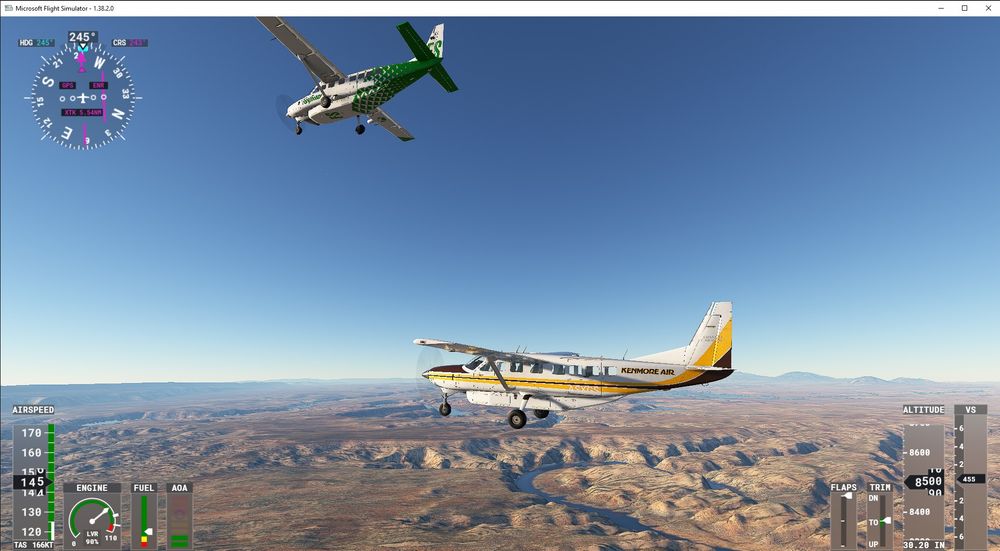 Screenshot of Flight Simulator, two Cessna 208 Caravans flying over the Utah desert 
