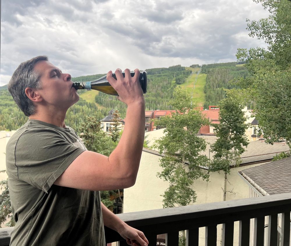 A haggard ex-HOA president celebrating with cheap prosecco after telling two insane residents that I’ve had it with their inane horseshit.