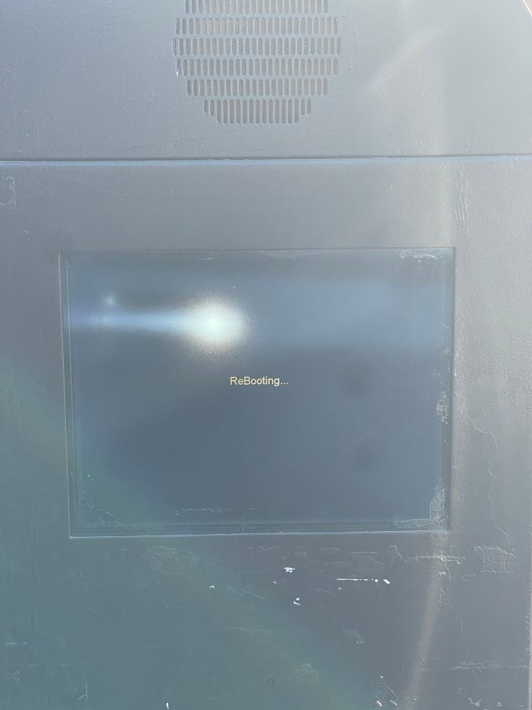 Drive through screen reads “ReBooting…” (note the capital “B”)