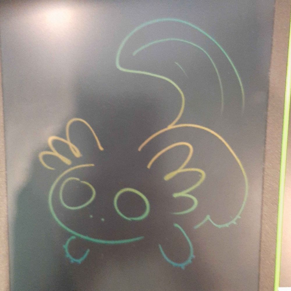 Cute axolotl sketched on an LCD drawing tablet.