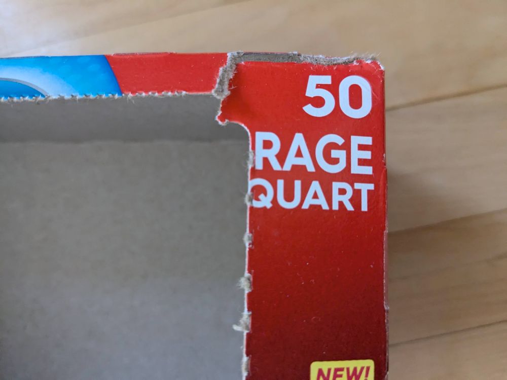 Photo of a box of quart-sized food storage bags, with the word "storage" torn along the perforations to read "rage quart."