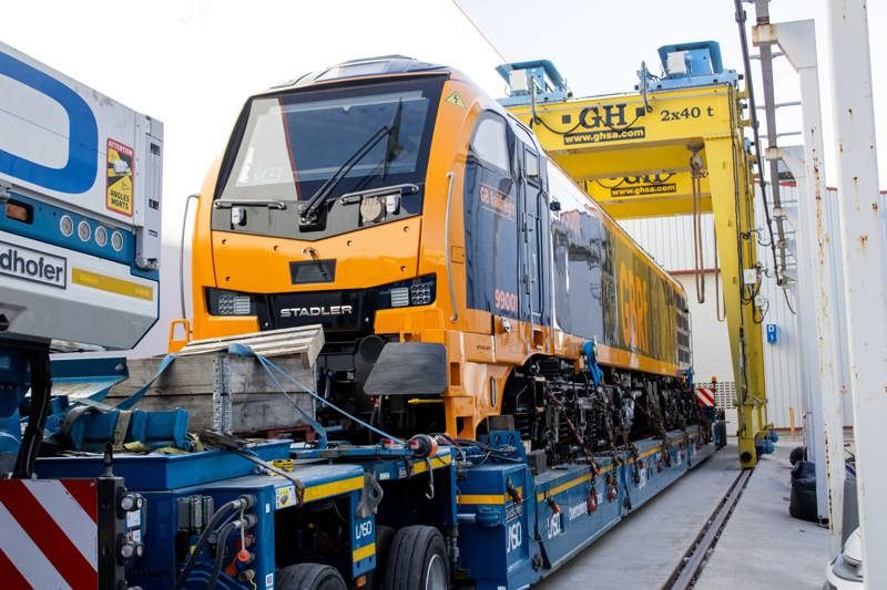 Class 99 GBRf Stadler train on top of a lorry loader