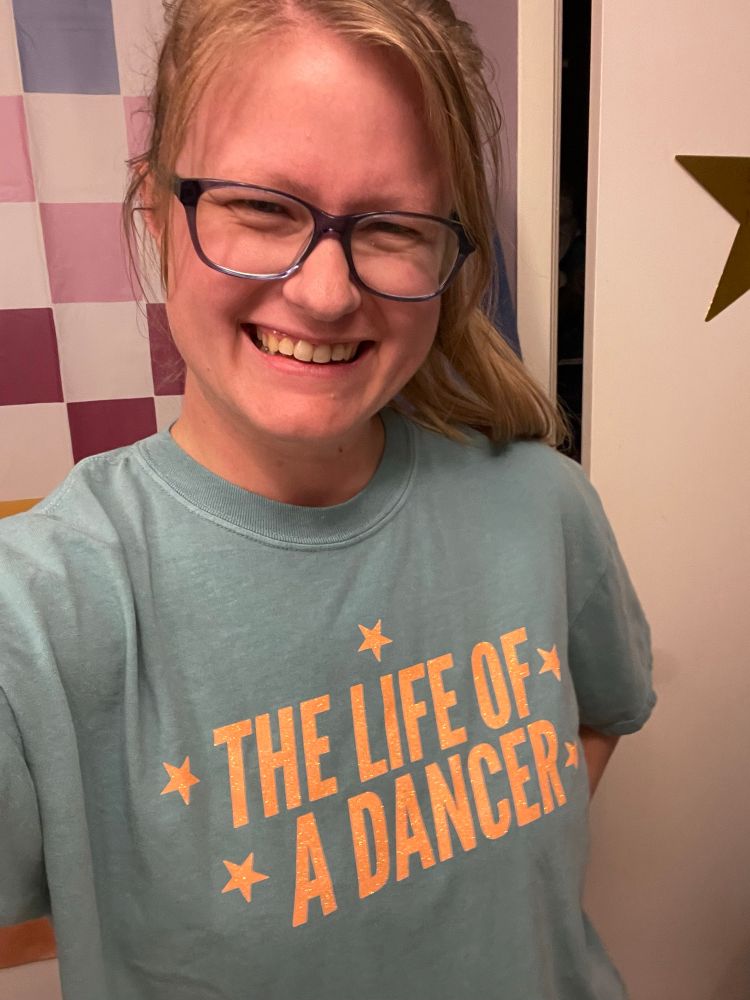 Woman in a T-shirt that says “the life of a dancer”