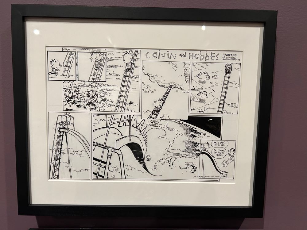 Framed black-and-white page of a Calvin & Hobbes Sunday strip.  Calvin is climbing a ladder up to the clouds that leads to a slide starting from the upper atmosphere.  Cut to Calvin at the top of a regular playground slide refusing to come down because it's too high.
