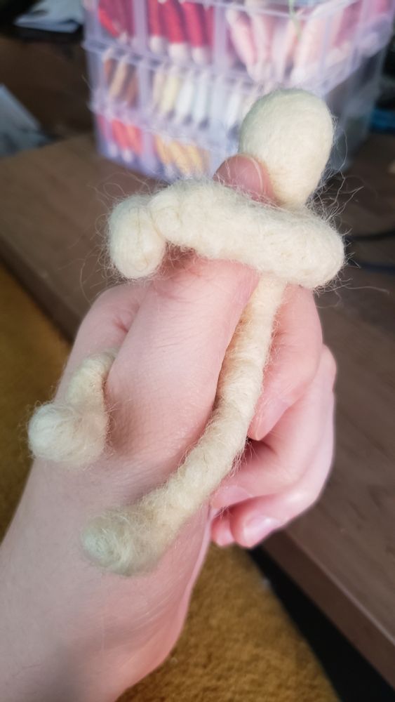 the doll has wrapped itself around brin's finger, still a little nervous