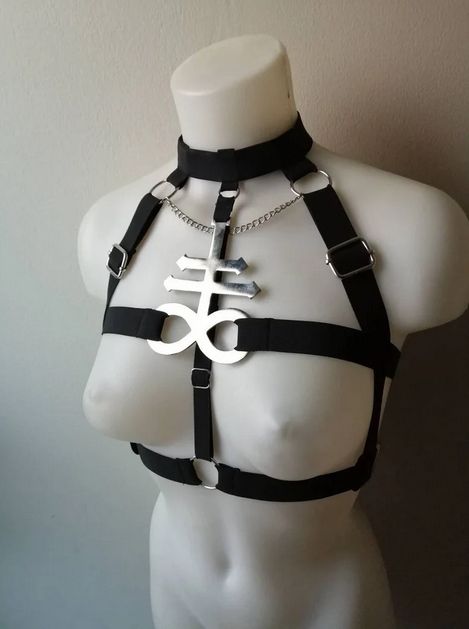 harness with giant lucifer symbol on it
