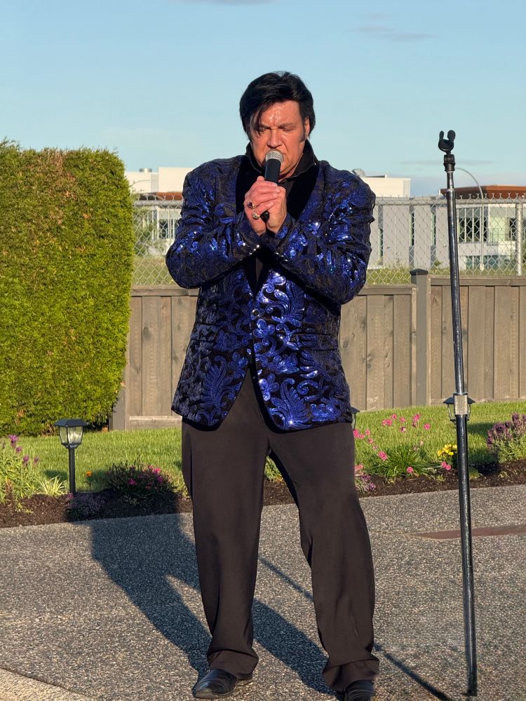 An Elvis impersonator rocks the streets of Port Coquitlam.