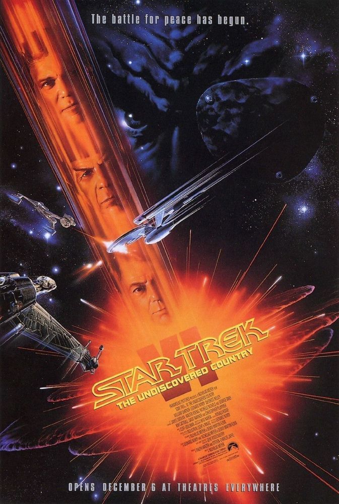 A movie poster for the film Star Trek VI: The Undiscovered Country. The poster features a dark background with a bright orange beam of light cutting through the center. The faces of the main characters, including Captain Kirk and Spock, are superimposed on the beam. Spaceships are visible in the background. The title "Star Trek VI: The Undiscovered Country" is displayed in large letters, and the tagline "The battle for peace has begun" is written above.