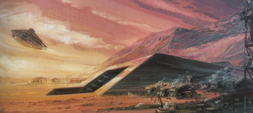 A concept art depicts a rugged, desert landscape under a dramatic sky. A large, dark, pyramidal structure with a prominent, luminous blue ramp leading into its interior dominates the mid-ground. To the left, a sleek, dark, alien spacecraft with a flat, triangular shape hovers in the air, departing from the pyramid. The landscape is characterized by reddish-brown earth and towering, craggy mountains in the background. The sky is a vibrant blend of oranges, reds, and purples, suggesting either a sunset/sunrise or an atmospheric anomaly. 