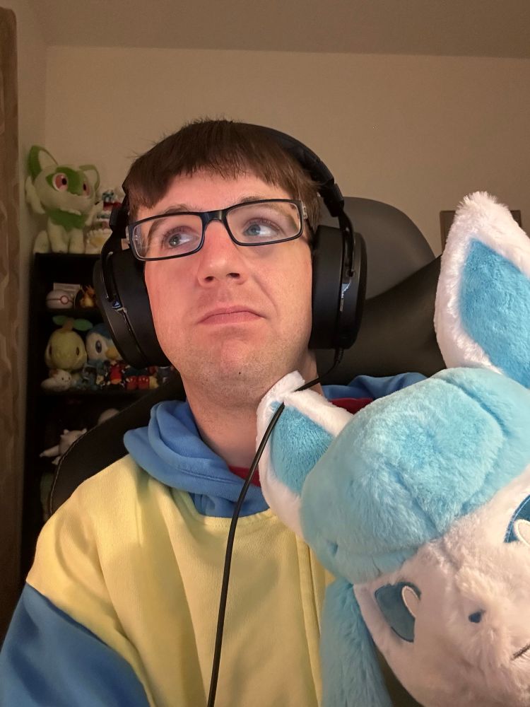 Gamer with Glaceon plush