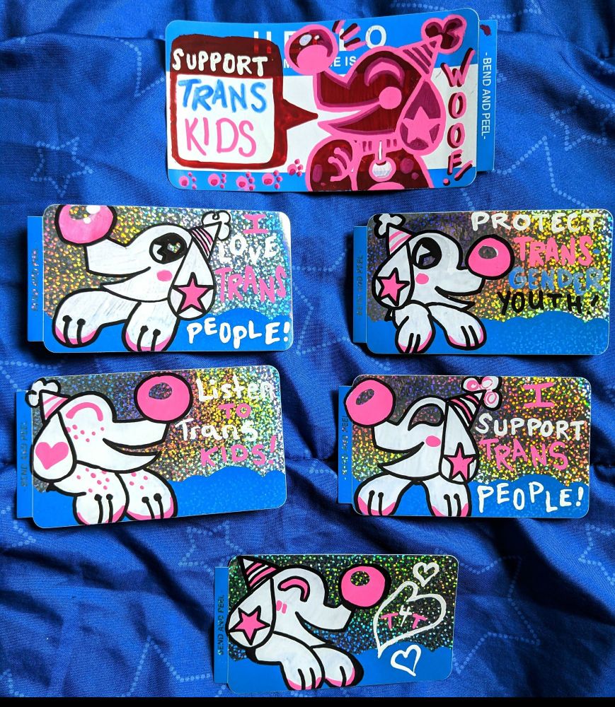 Some illustrations from 2023 that were sent to members of my sticker club. They say Support Trans Kids and have a clown puppy in the clouds drawn on them