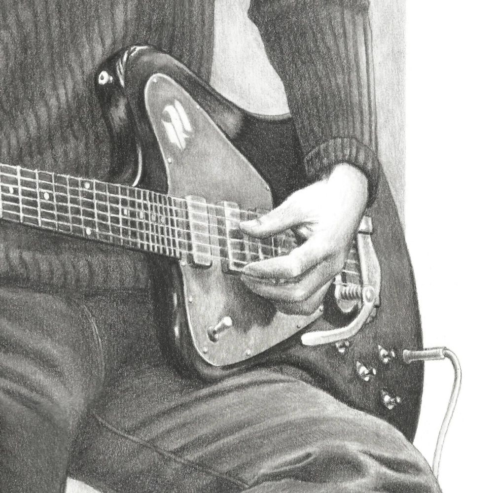 Detail of a graphite pencil drawing of Paul McCartney playing bass in 1970