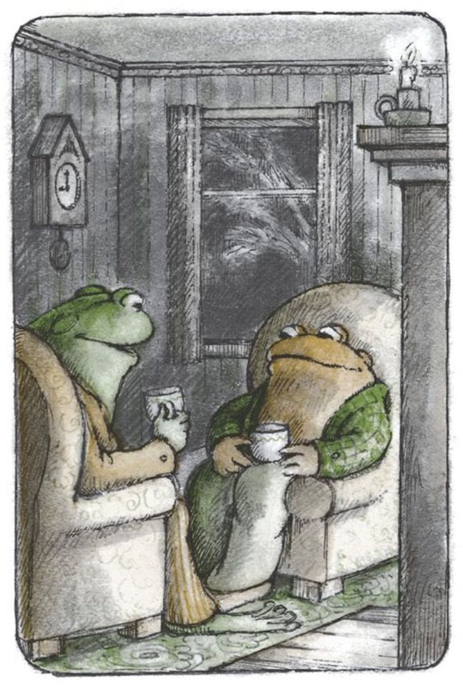 Frog and Toad craddle warm cups of tea in their hands, as they sit in cozy chairs in front of the fire.

From "Shivers"
In *Days with Frog and Toad*