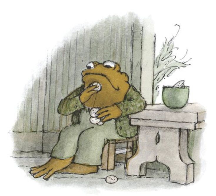 Toad sits in a chair, cramming cookies into his mouth.

From "Cookies"
In *Frog and Toad Together*