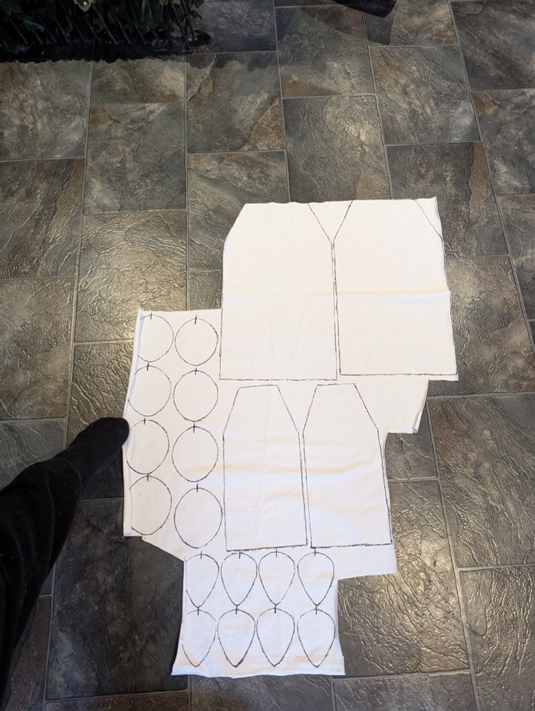 Pouch pattern drawn out on fabric. 
