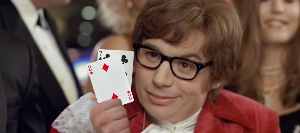 Screengrab from Austin Powers, where Austin is holding a seven and a two, playing cards