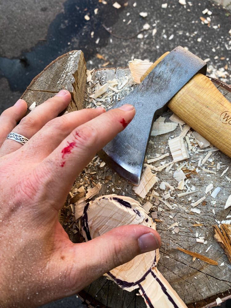 Axing out a spoon blank and had an axe-ident shaving a bit of skin from my index finger. Whoops.