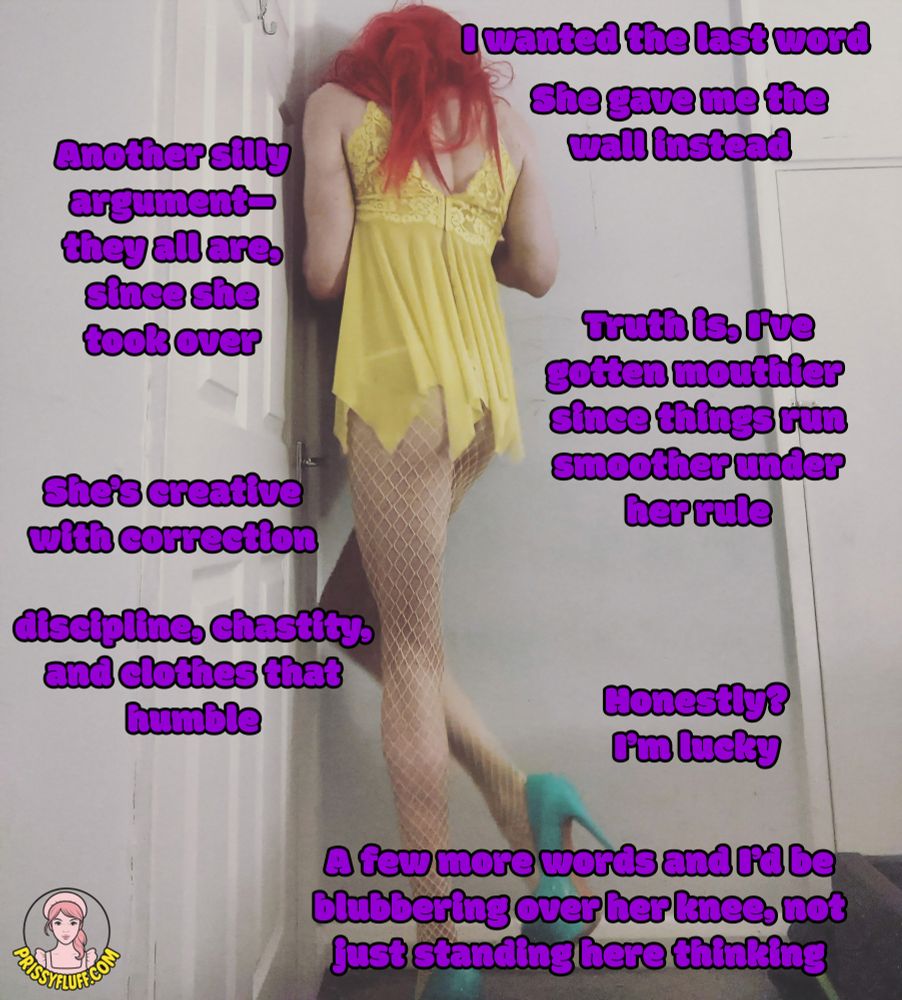 A feminized sissy stands in the corner, nose to the wall. She wears a short, sheer yellow babydoll with lace trim, white fishnet tights, and bright turquoise platform heels with extremely high stilettos. Her long, vibrant red wig hangs forward, partially obscuring her face, while one leg is lifted in a nervous or performative pose. The setting appears to be a plain, dimly lit room with scuffed white walls and a white door. Her body language is timid and chastised, evoking a sense of ritual humiliation or correction. The image captures themes of obedience, feminization, and enforced stillness.

The embedded caption reads, “I wanted the last word. She gave me the wall instead. Another silly argument—they all are, since she took over. Truth is, I've gotten mouthier, since things run smoother under her rule. She’s creative with correction: discipline, chastity, and clothes that humble. Honestly? I’m lucky. A few more words and I’d be blubbering over her knee, not just standing here.”