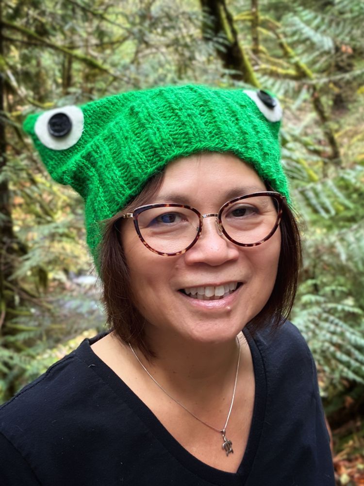 woman wearing Portland Frog Hat