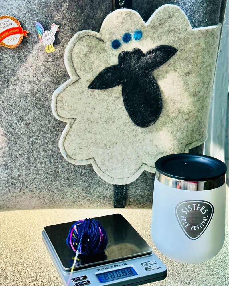 4 grams of yarn on a scale, sheep tote bag