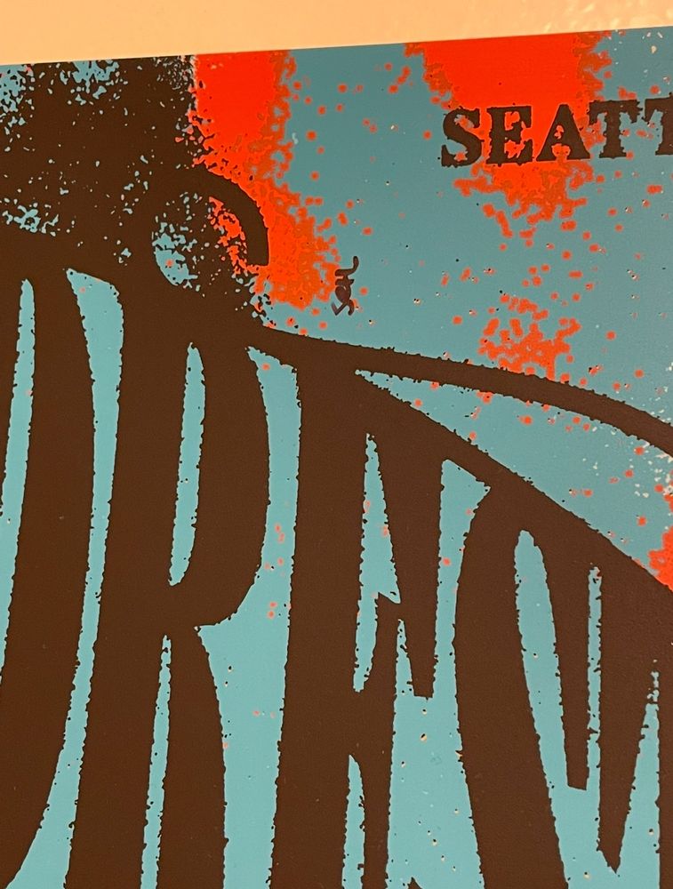 A close up of the Car Seat Headrest Concert poster, just above the second E in “headrest” you can see the tiniest “Seth” written horizontal in sharpie.