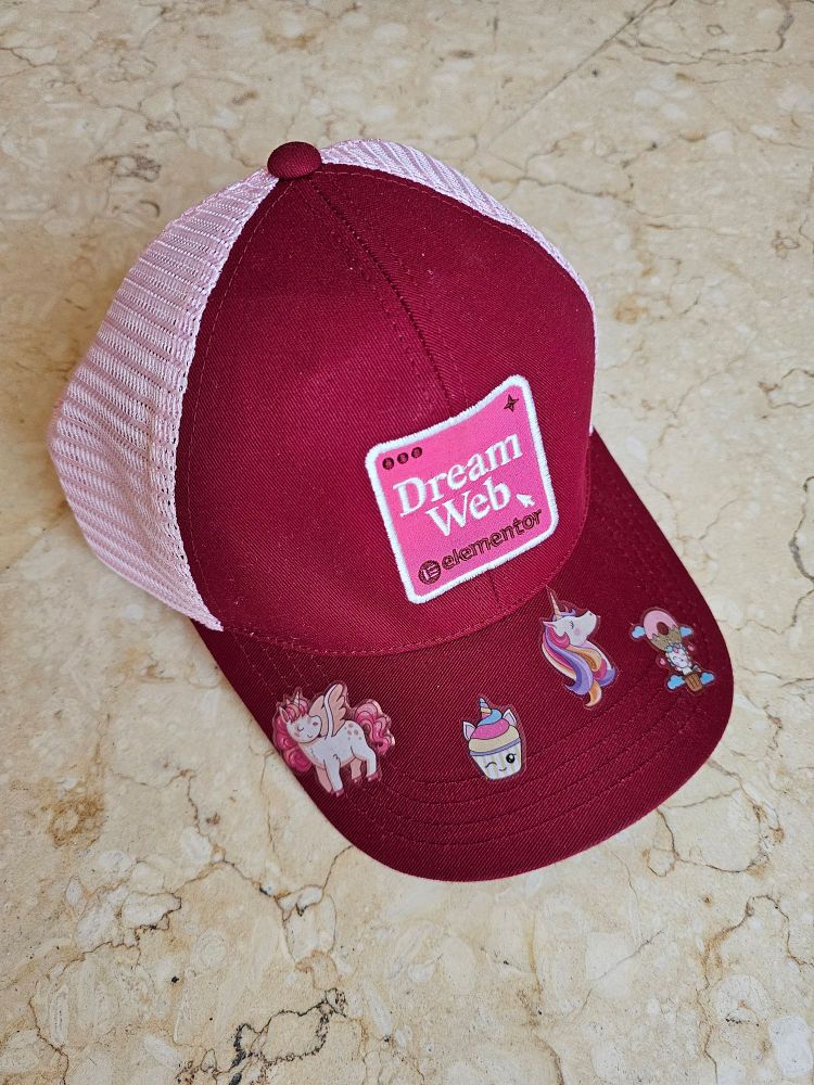 Elementor cap with unicorn stickers.