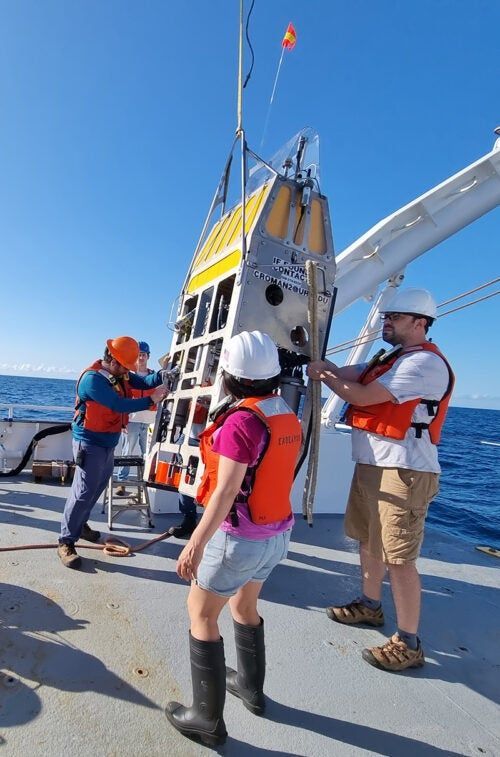 On the fantail of R/V Endeavor, students prepare VAMPIRE for deployment and testing.