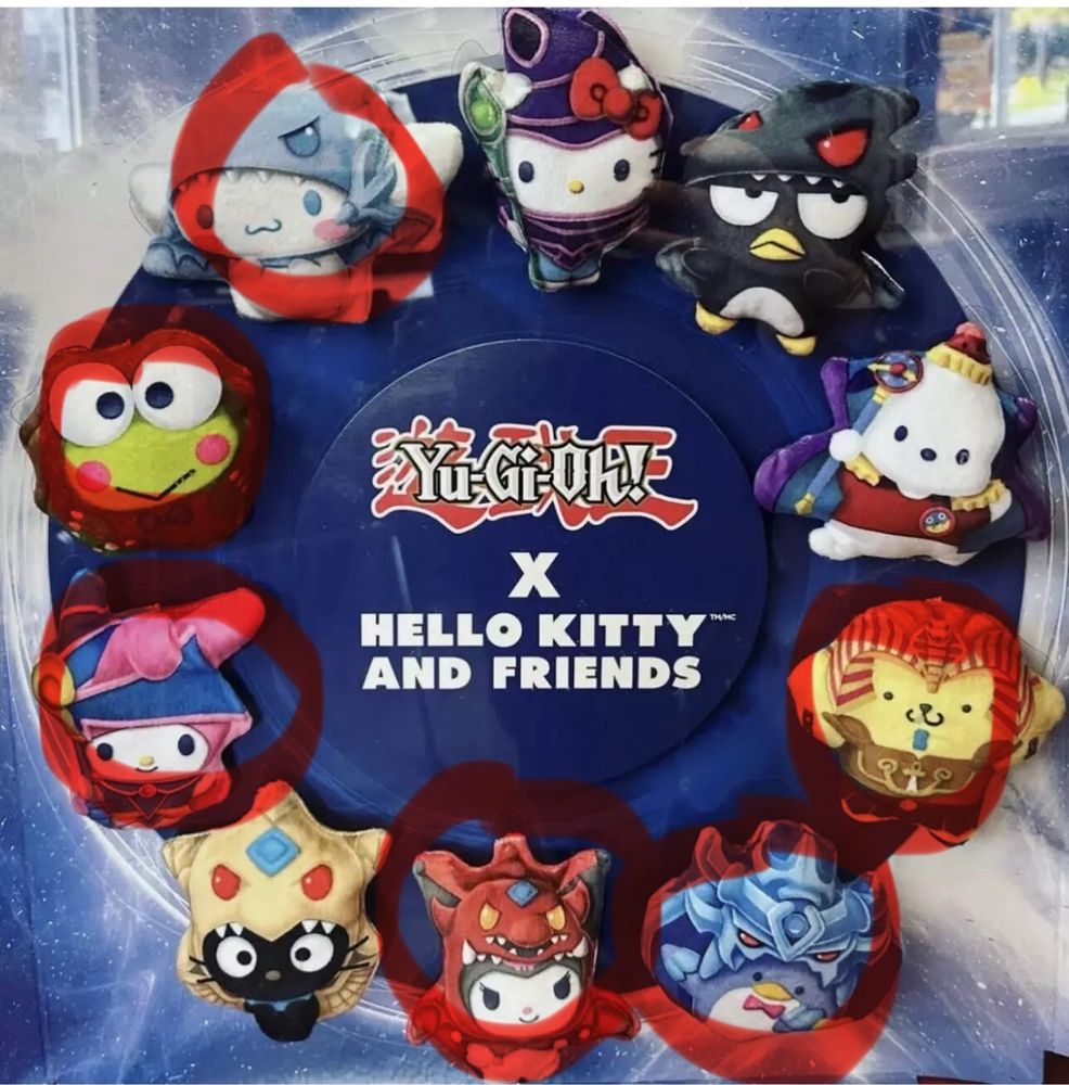 A picture of all of the yu gi oh and hello kitty collaboration McDonald’s toys in that window display they put the happy meals toys in and I’ve circled the ones I have in red. I have 6/10