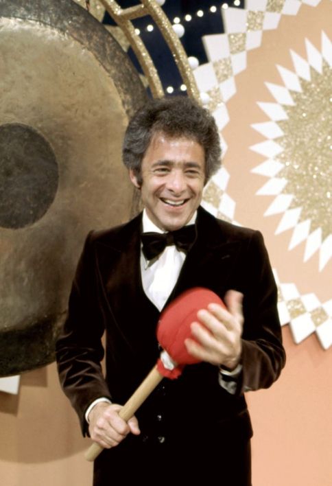Chuck Barris preparing to gong someone