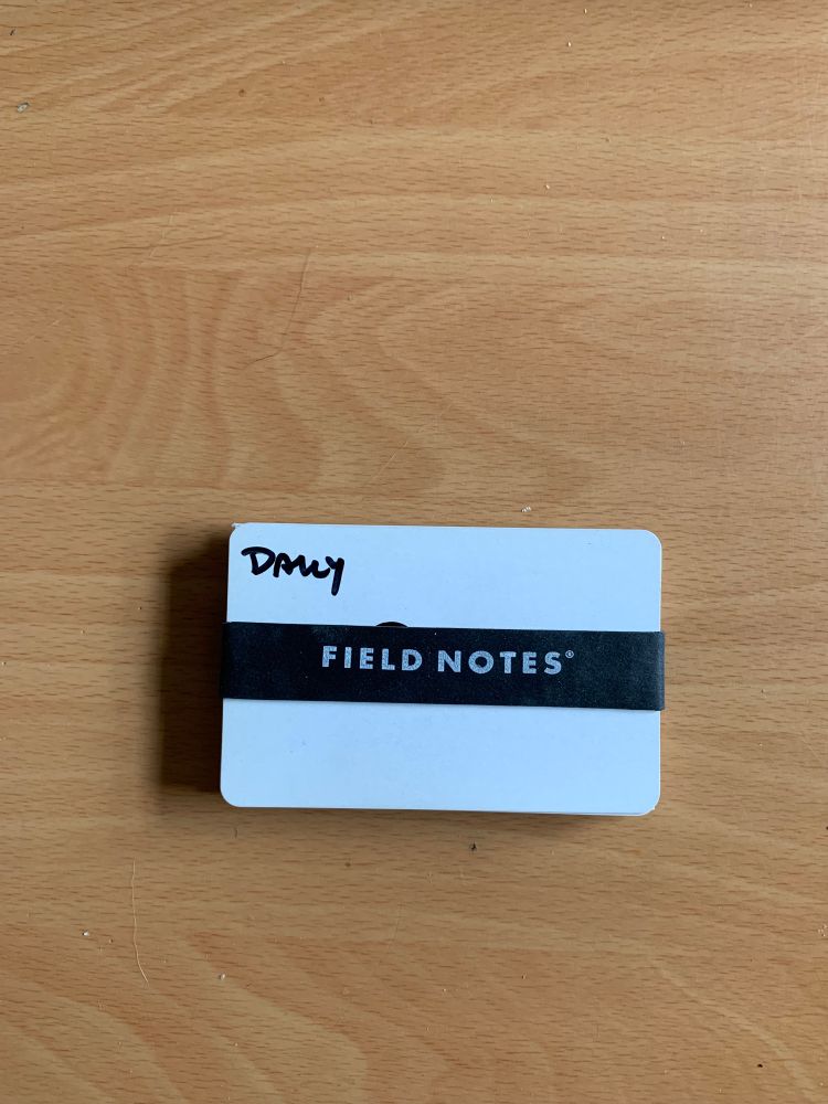 Hipster PDA (stack of cards with dividers) held together by Field Notes elastic