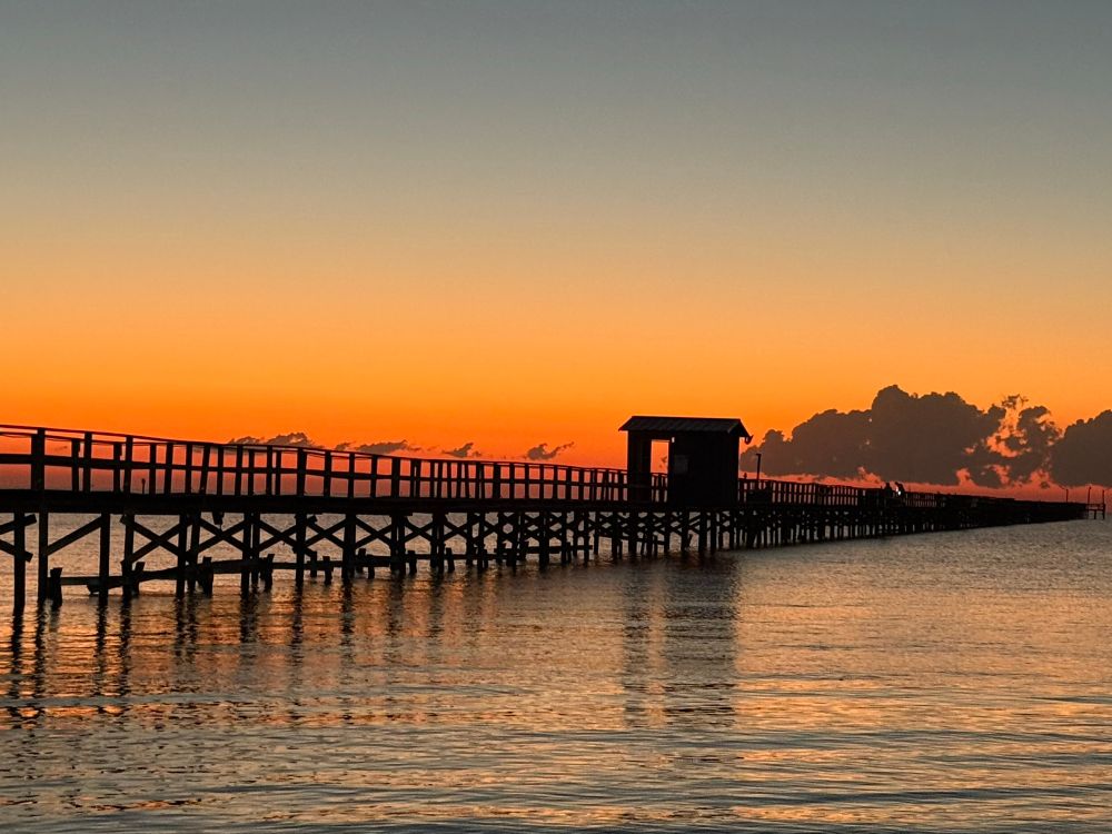Dawn on Aransas bay with fishing pier. 

Not shown: a fool dreaming of moving to Canada 