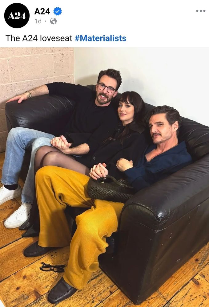 Photo of Chris Evans, Dakota Johnson and Pedro Pascal holding hands.