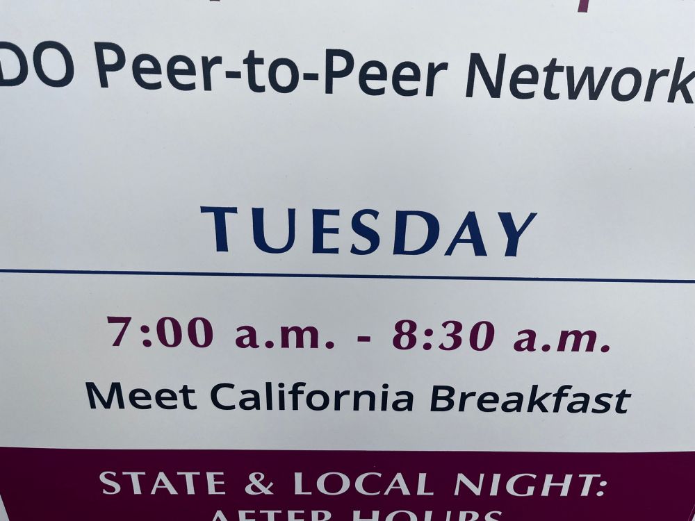 A sign reading “Tuesday
7:00 a.m. - 8:30 a.m.
Meet California Breakfast”