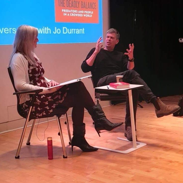 Jo interviewing Adam on stage  