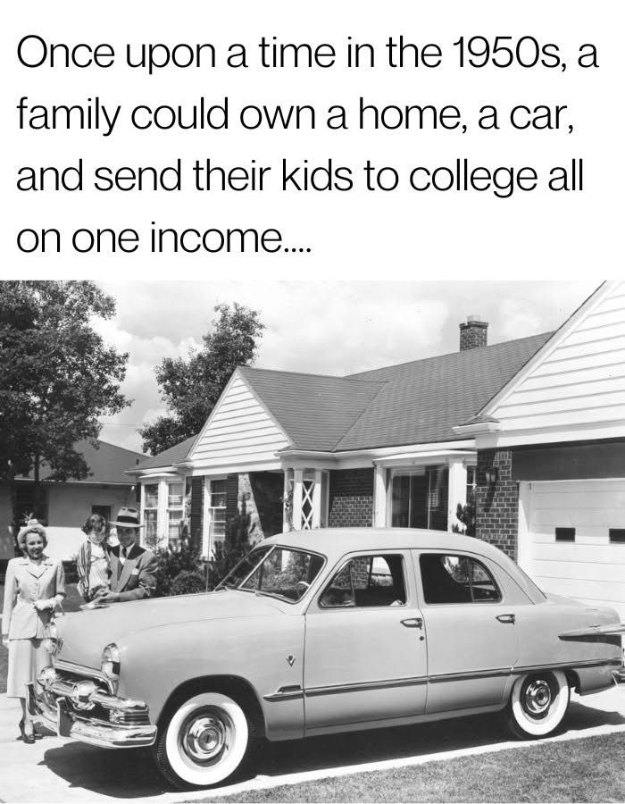 Black and white pic of a family standing in front of their house.