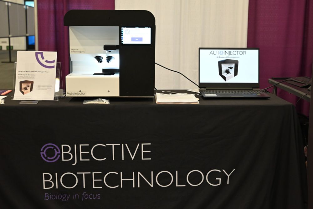 Photo of the Autoinjector instrument and the Objective Biotechnology booth.